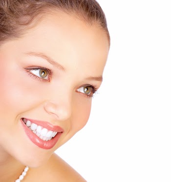 Beautiful young smiling woman. Isolated over white  background