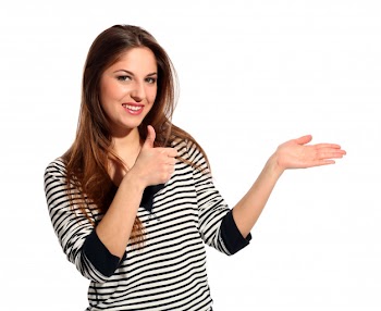 Beautiful young woman shows on something Free Photo