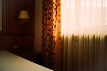 Bedroom With Sunlight Through The Window