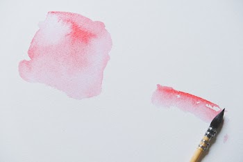Beige and Black Paint Brush on Surface