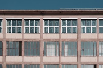 beige and gray concrete building during daytime