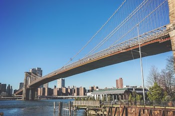 beige concrete bridge on bottom view photo