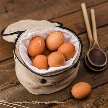 Beige Egg Inside a White Bag
