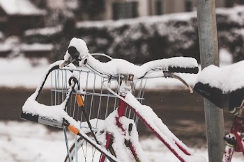 Bicycle Covered In Snow