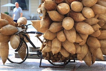 Bicycle Loaded With Brown Sacks
