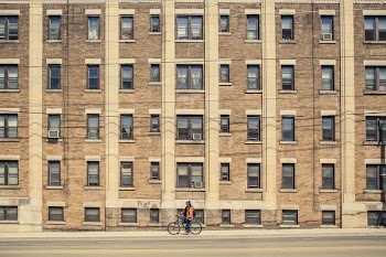 Bicycle Outside Apartment Building