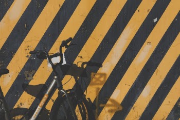 Bicycle Parked By The Wall