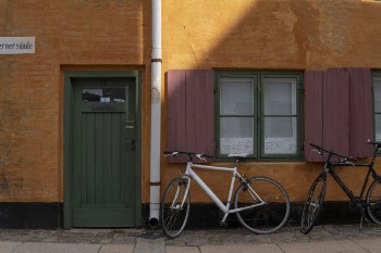 Bicycles Parked by Building