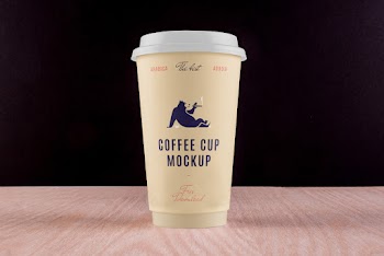 Big Coffee Cup on Desk Mockup