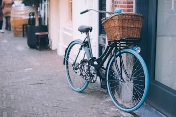 bike parked on the side of the building