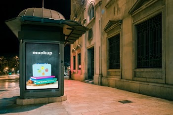 Billboard mockup in front of old building Free Psd
