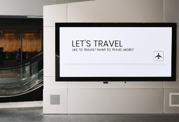 Billboard mockup near an escalator at a train station Free Psd
