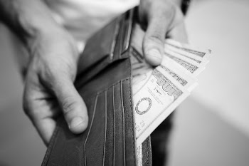 Bills in a wallet, black | Free Photo - rawpixel