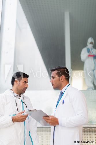 Biochemists with clipboard talking