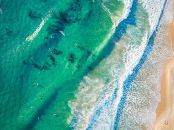 Bird's Eye Photography Of Body Of Water Near Shore