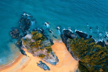 Bird's-eye Photography of Mountain Near Shore