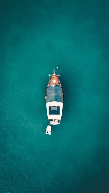 Bird's-eye Photography of White Boat