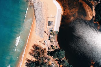 Bird's Eye View of an Island Surrounded by Body of Water