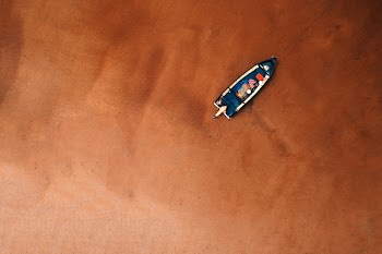 Bird's Eye View Of Boat On Seashore