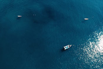 Bird's Eye View Of Boats On Ocean