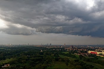 Bird's Eye View Of City Under Cloudy Sky