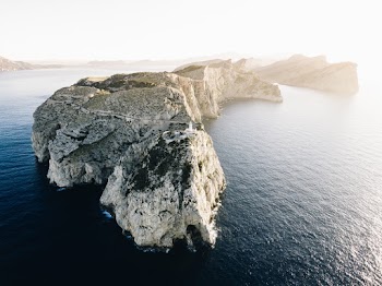 Bird's Eye View of Rock Formation On Ocean