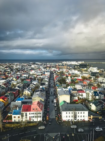 Bird's Eye View of Town Under Cloudy Sky