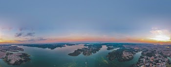 Bird's Eye View Photography of Body of Water Under Blue Sky