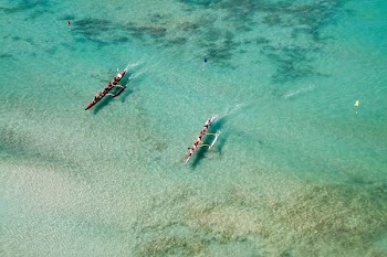 bird's eye view of two boats on body of water