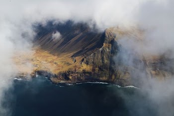 bird's eye view photography of cliff and mountain
