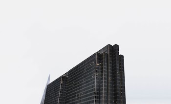 bird's eye views of building under cloudy sky