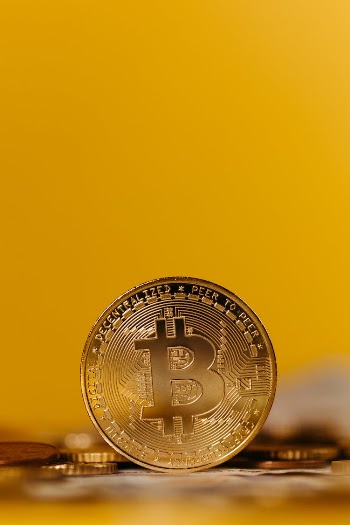 Bitcoin on Yellow Background