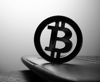 Bitcoin Symbol on Laptop Surface