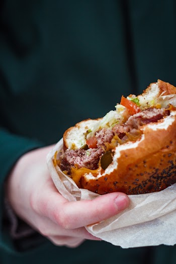 Bitten Hamburger With Vegetables