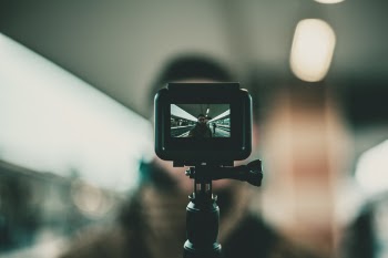 Black Action Camera With Stand