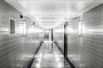 Black &amp; White Tiled Hallway Free Photo 