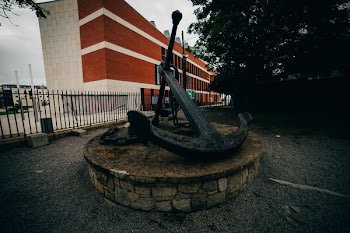Black Anchor Statue Near Green Leafed Tree