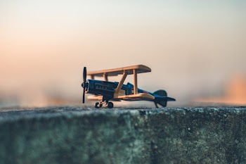 Black and Brown Wooden Plane Scale Model