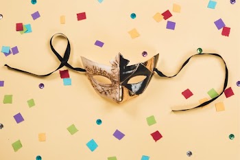 Black And Gold Mask On Yellow