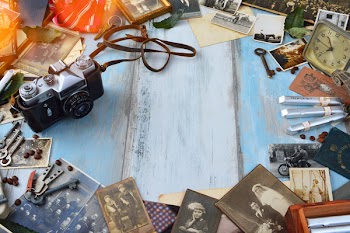 Black and Gray Camera on Blue Table