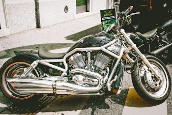 Black and Gray Cruiser Motorcycle Parked on the Street