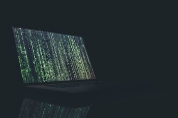 black and gray laptop computer turned on