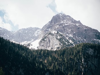 Black and Gray mountain with snow