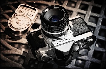 Black and Gray Nikkormat Mirrorless Camera