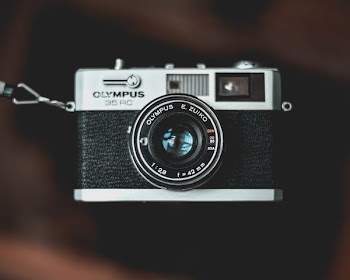 black and gray Olympus 35 RC camera