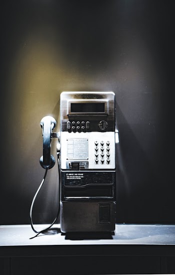 Black and Gray Payphone
