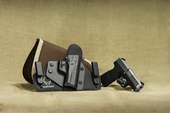 Black and Gray Semi-automatic Pistol Near Holster