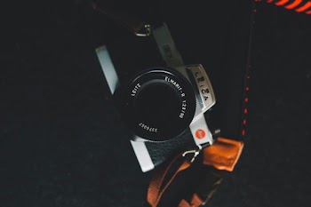 black and gray SLR camera