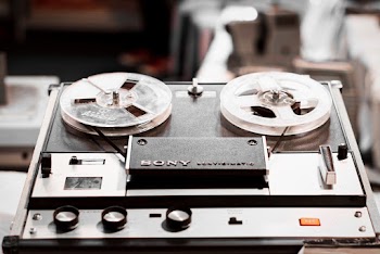 Black and Grey Sony Reel Tape Player