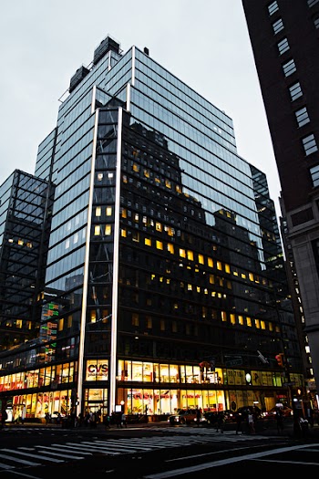 Black and Silver Building Under Blue Sky
